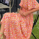 Jagna – Elegancka sukienka maxi z dekoltem w serek